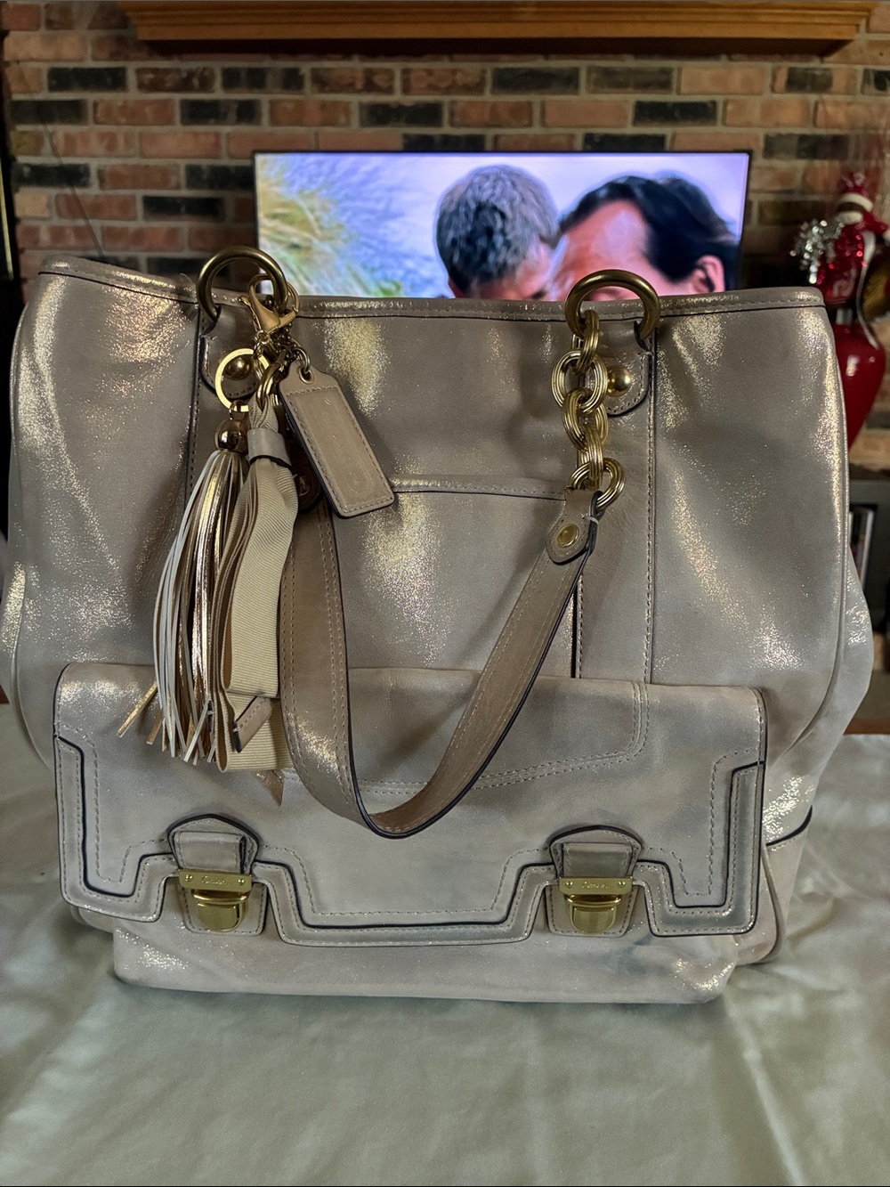 Coach Metallic Champagne Shoulder Bag with Tassel and Gold Hardware